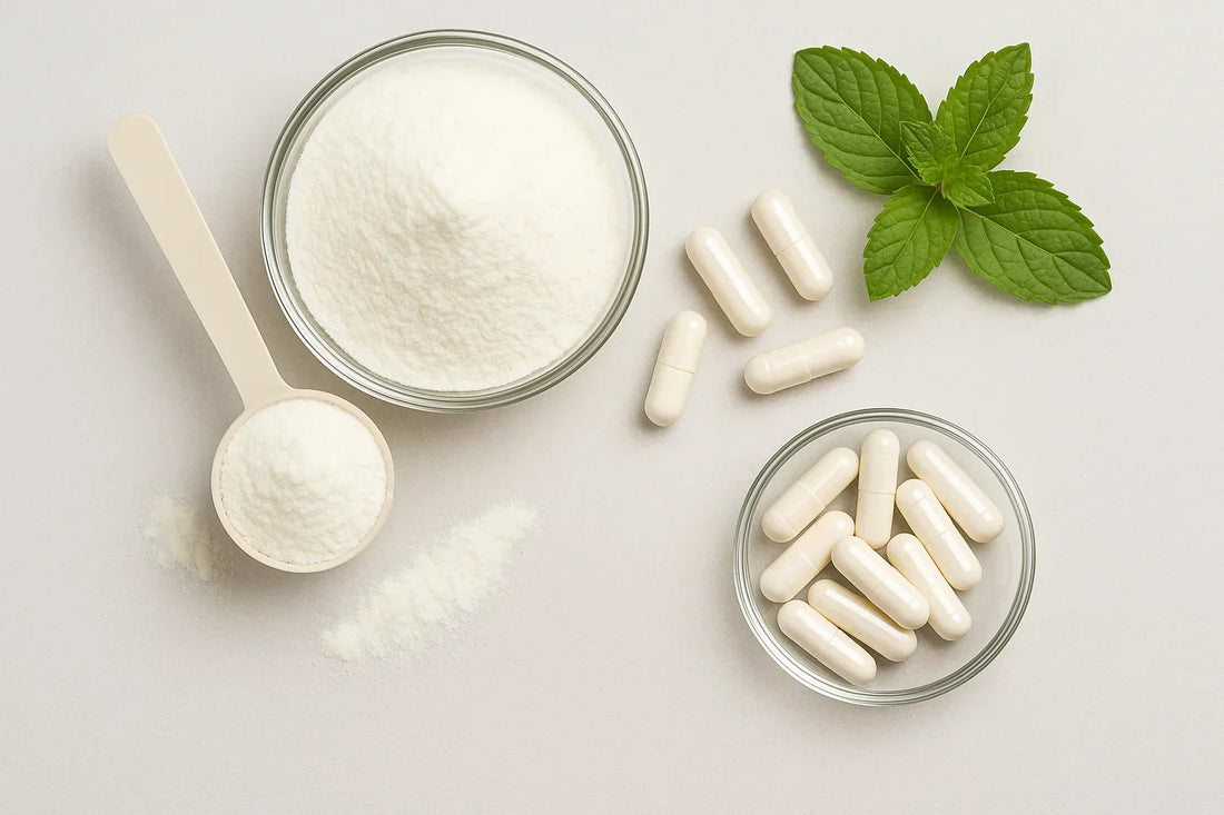 L-Glutamine supplement powder and capsules with scoop and mint leaves.