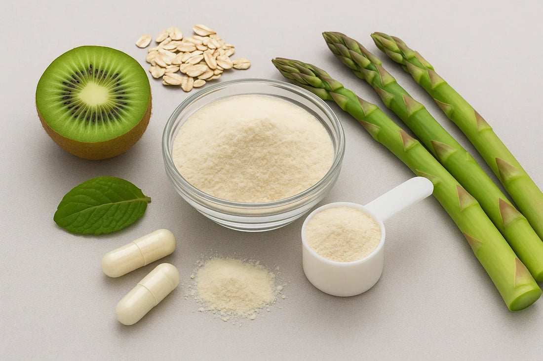 Prebiotic fibre sources including asparagus, kiwi, oats, and supplement capsules arranged with powder on a light background.